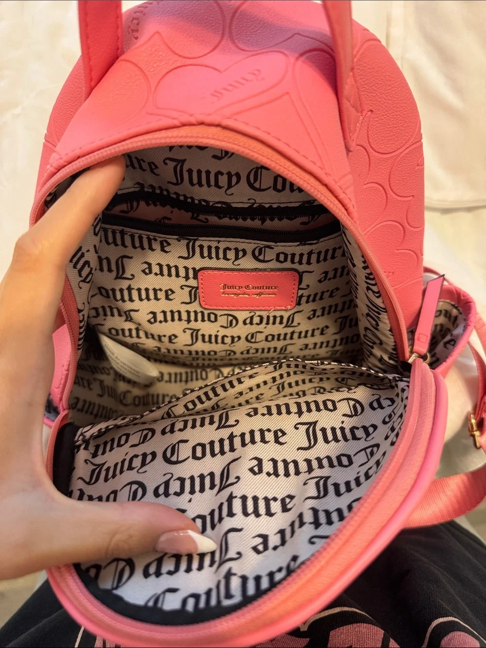 Juicy Couture Coral Pink Heart-Embossed Mini Backpack